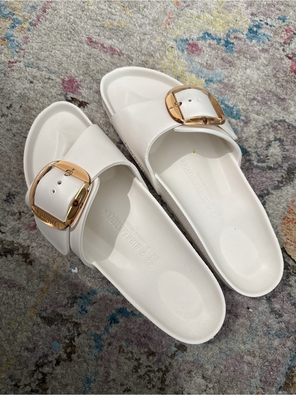 Birkenstock White Slide Sandals with Gold Buckle